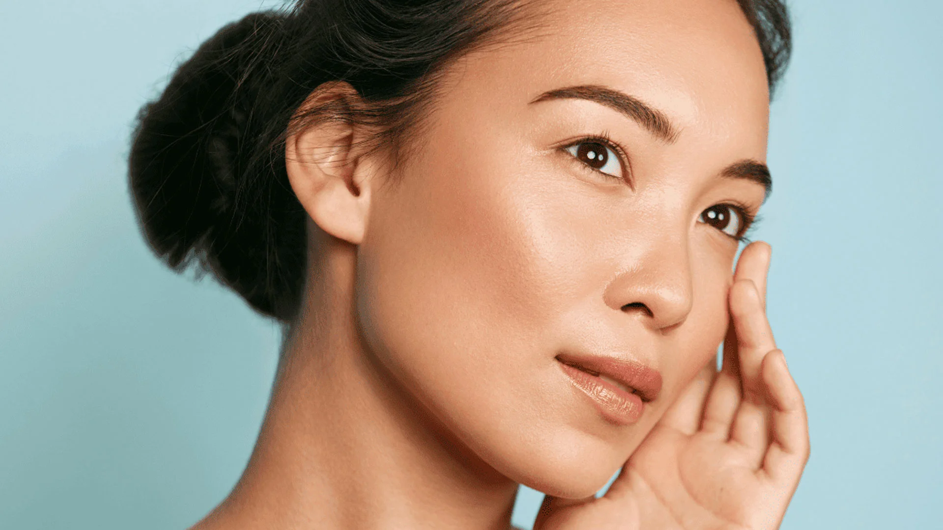 Dr. Ward consulting a patient about surgical facial rejuvenation at Ward Institute in Salt Lake City, emphasizing natural and confident results.